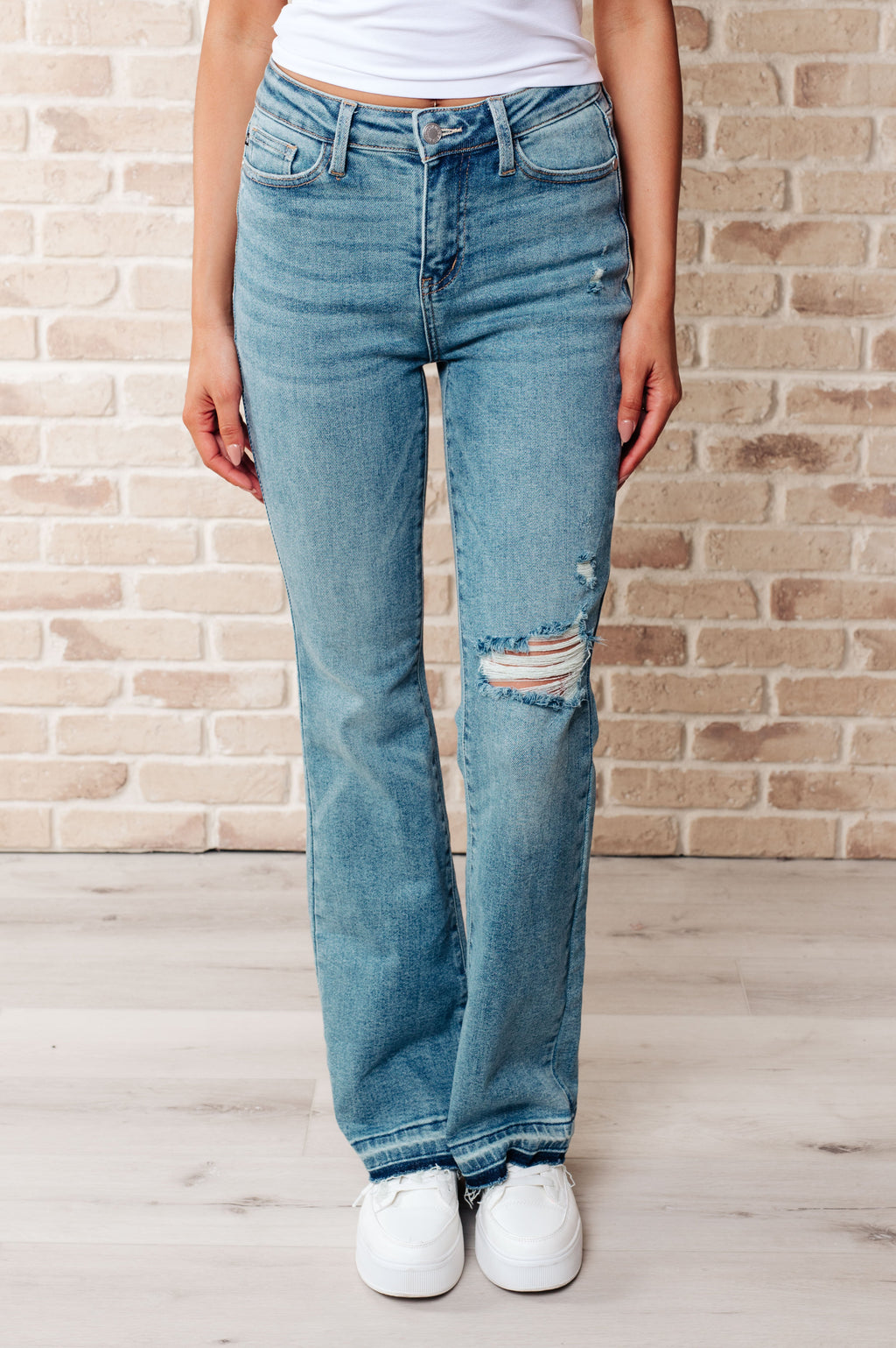 Judy Blue Mid Rise Distressed Released Hem Bootcut Jeans