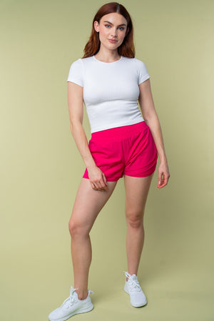 High Waisted Knit Athletic Shorts with pockets in Fuchsia