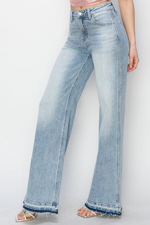 Risen High Rise Wide Leg Release Hem Light Wash Jeans