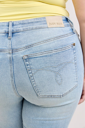 Judy Blue Mid Rise Kick Flare Raw Hem Cropped Jeans