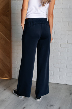 Resort Travel Wide Leg Scuba Pant in  Navy by Dear Scarlett