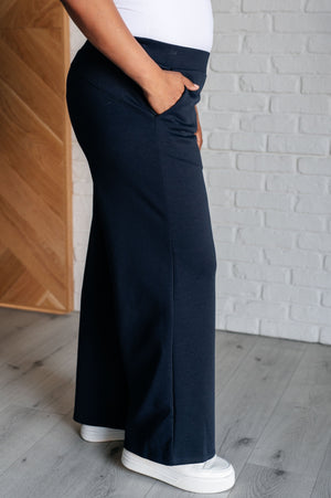 Resort Travel Wide Leg Scuba Pant in  Navy by Dear Scarlett