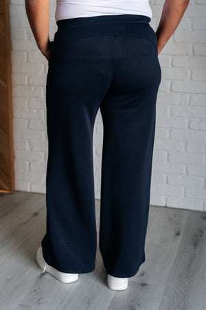 Resort Travel Wide Leg Scuba Pant in  Navy by Dear Scarlett