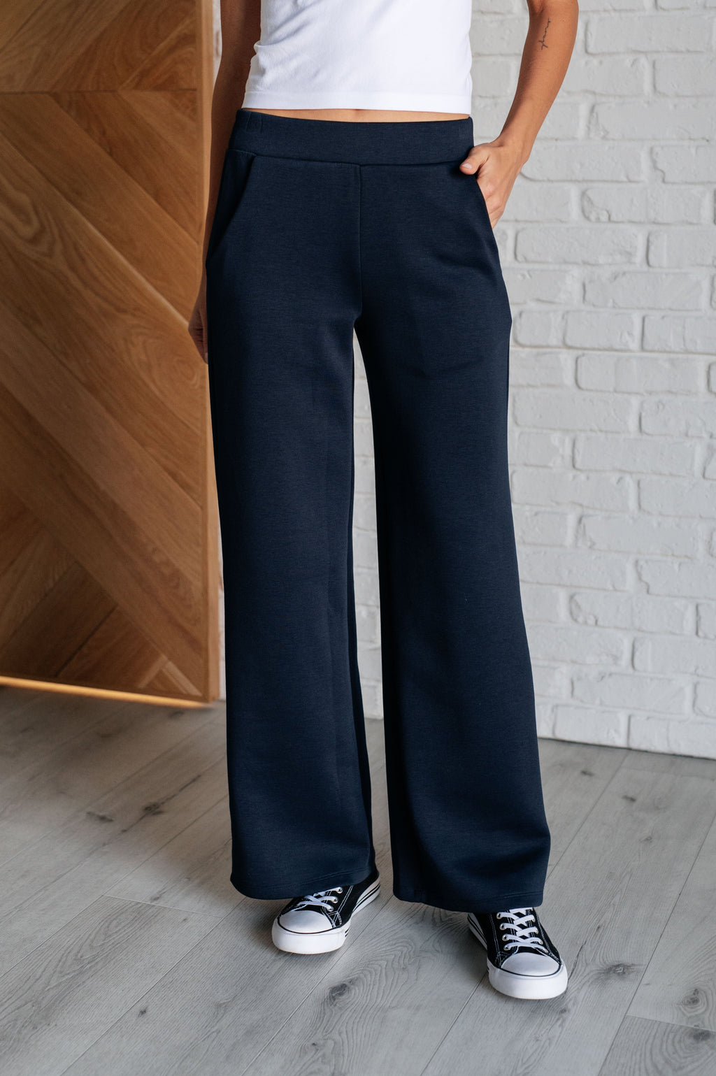 Resort Travel Wide Leg Scuba Pant in  Navy by Dear Scarlett