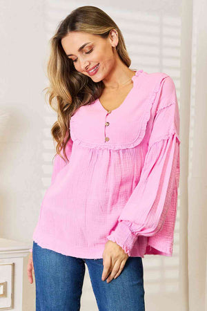 Exposed Seam Buttoned Notched Neck Blouse in Pink